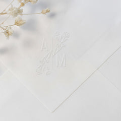 Timbre à sec initiales fleuries